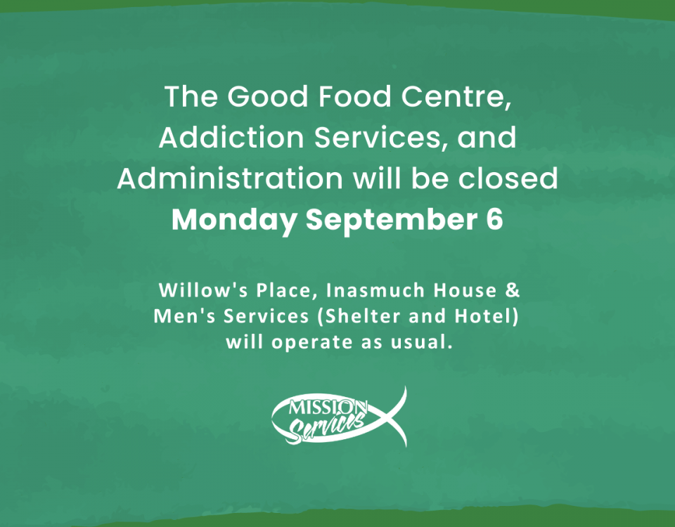 White text on a green textured background reads: "The Good Food Centre, Addiction Services, & Administration will be closed on Monday, September 6, 2021 for the Labour Day long weekend. Willow’s Place, Inasmuch House, and the Men’s Shelter will operate as usual." A white Mission Services fish logo is centred beneath the text.